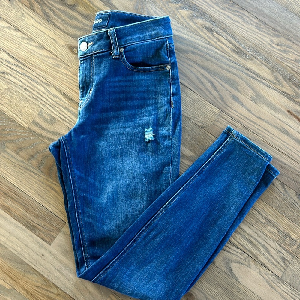 Midrise distressed skinny jeans